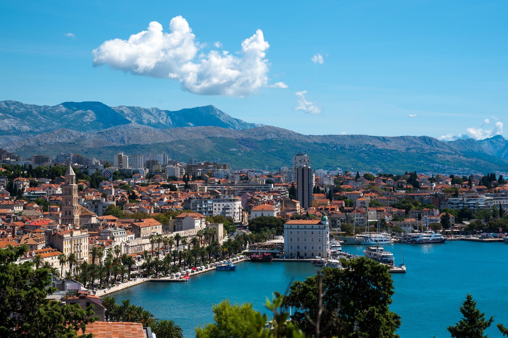 Split's harbour and bell tower under the Mosor mountains, half an hour from the runway