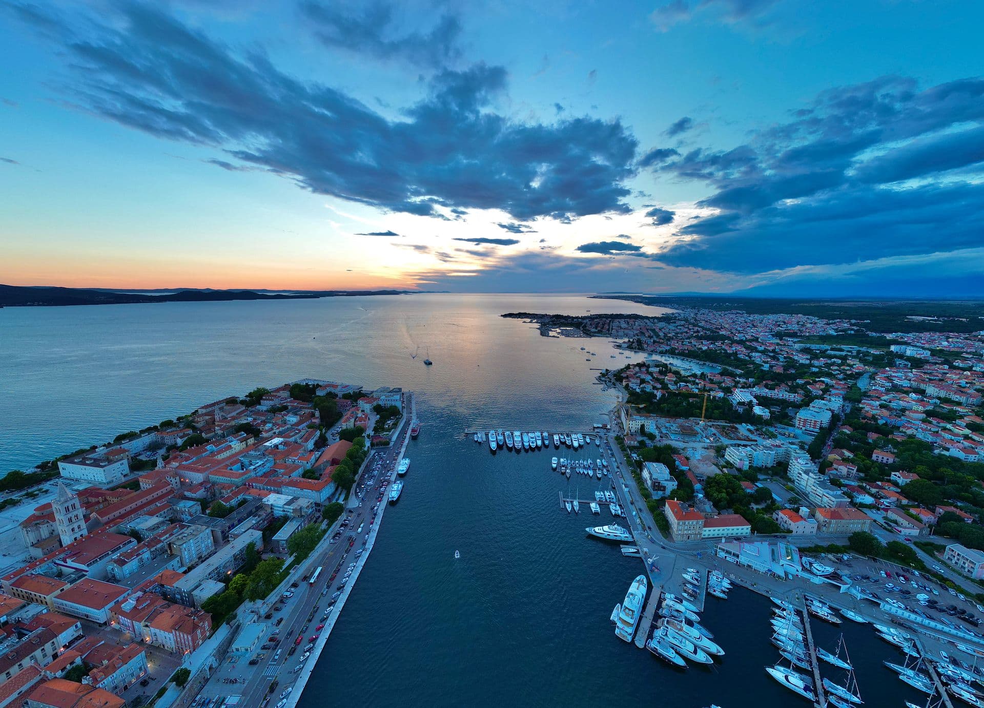 The old town peninsula and marina from the air at dusk